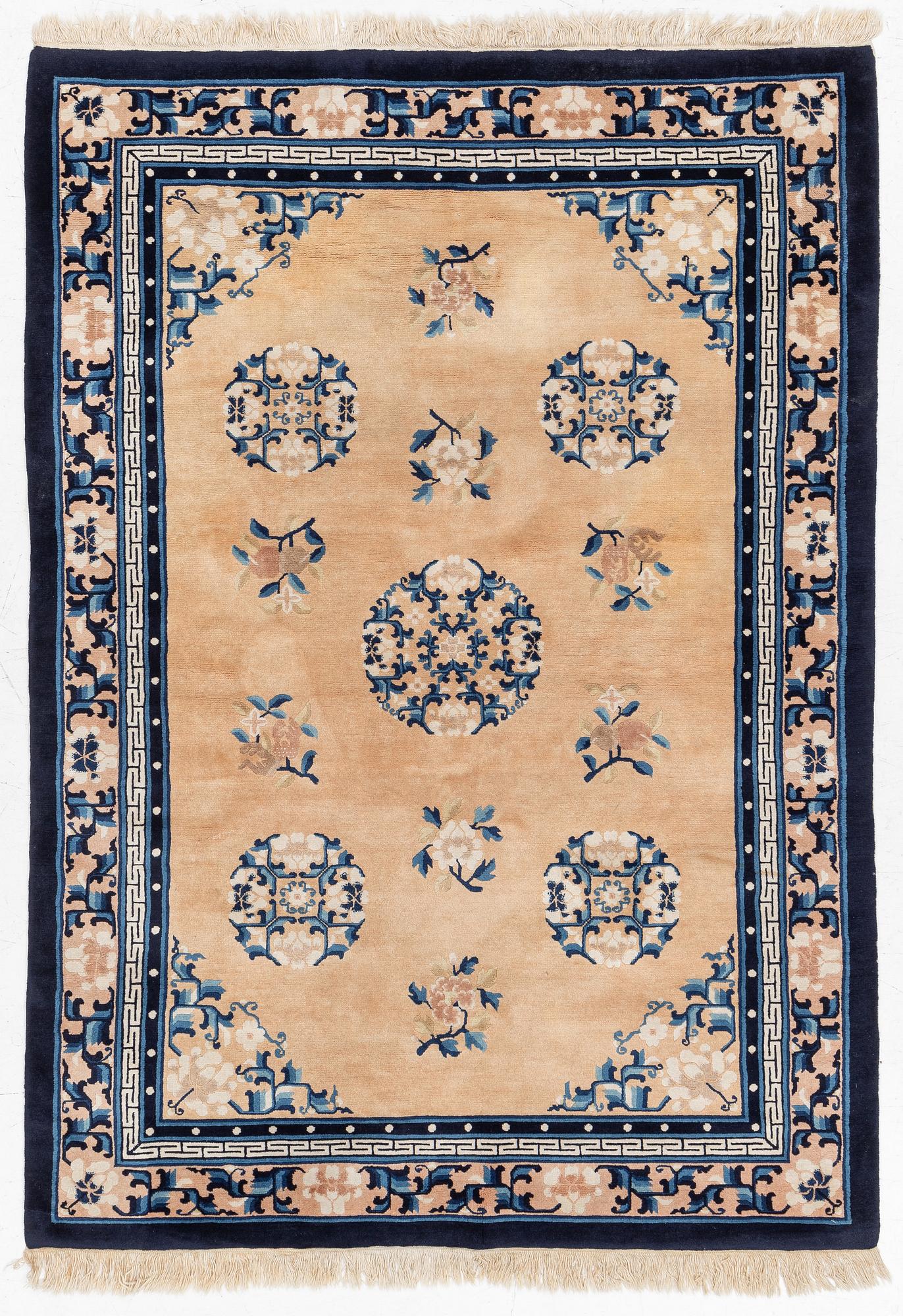 A semi-antique chinese rug, c. 195 x 132 cm .