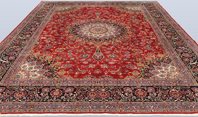 A Kashmar carpet, approx. 387 x 297 cm.