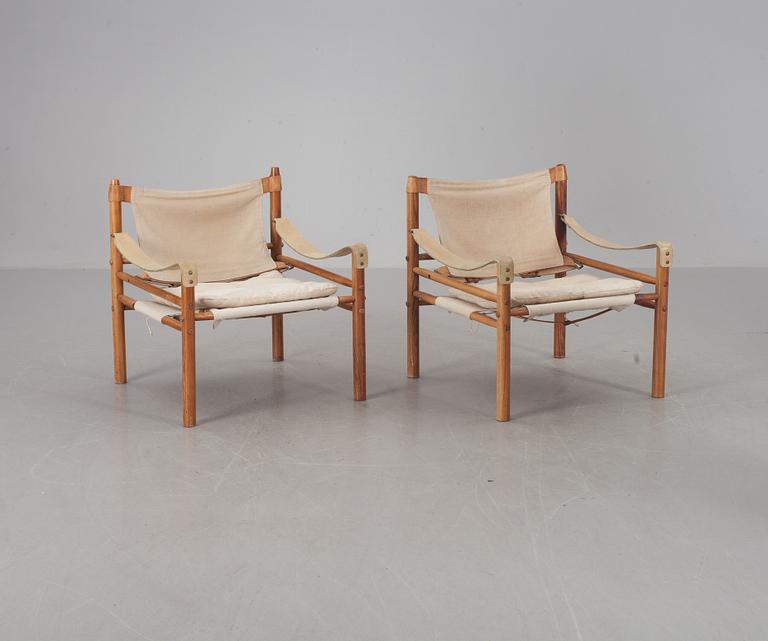 FÅTÖLJER, ett par. "Sirocco", Arne Norell, modellen formgiven 1964. CITES-intyg medföljer.