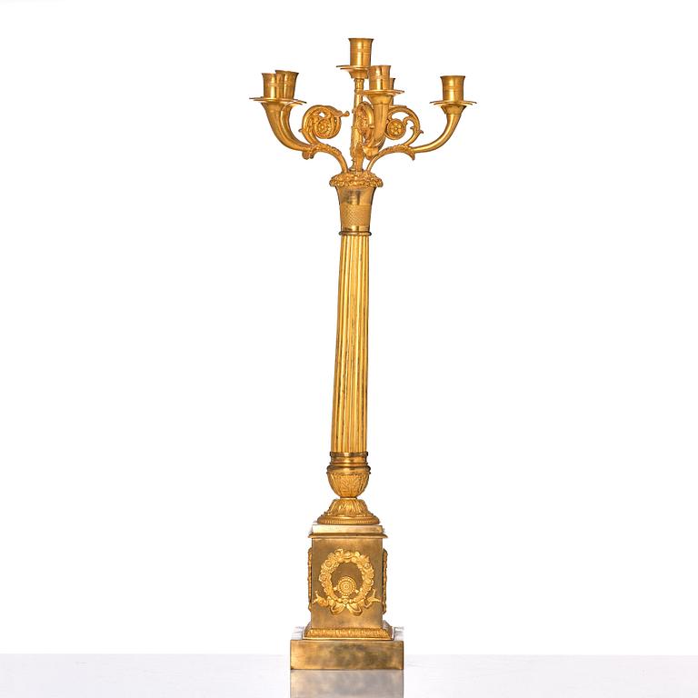 A French late Empire gilded six-light candelabra, mid 19th century.