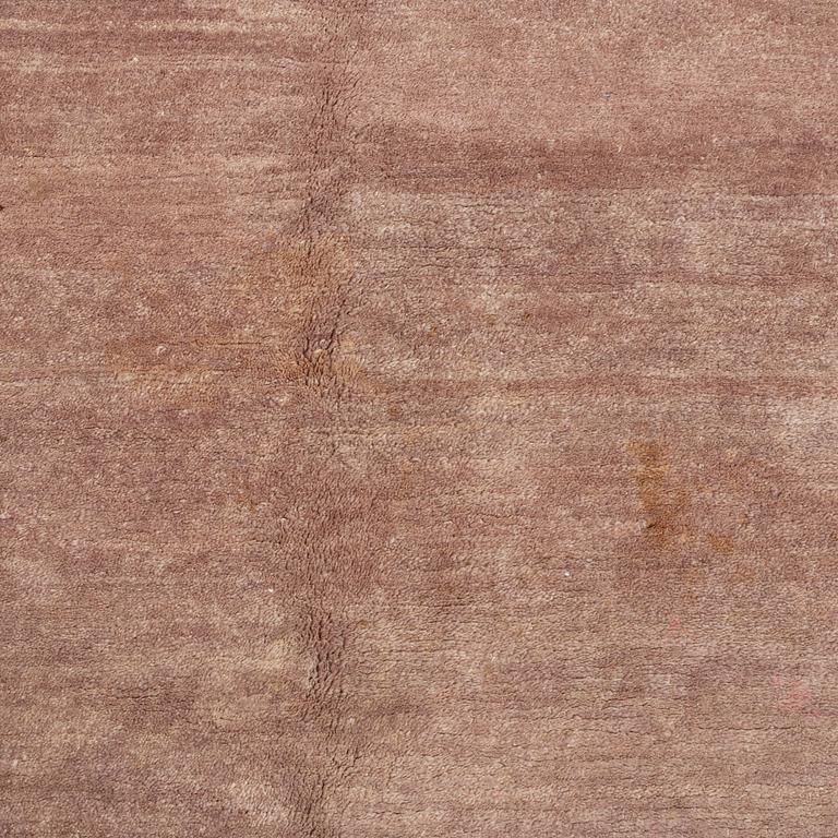A carpet, Tibet, c. 245 x 357 cm.