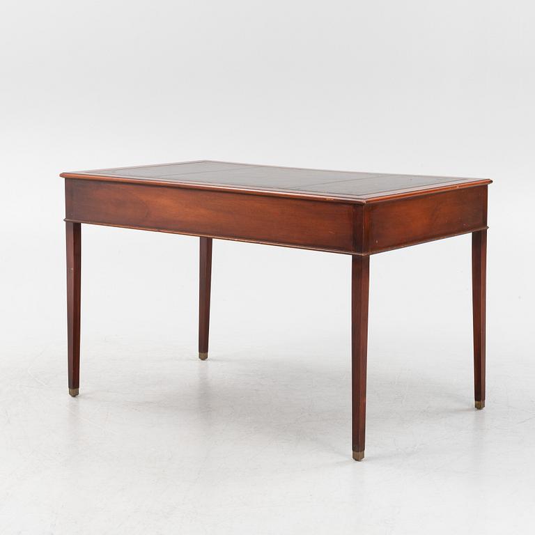 An English style mahogany desk, second half of the 20th century.
