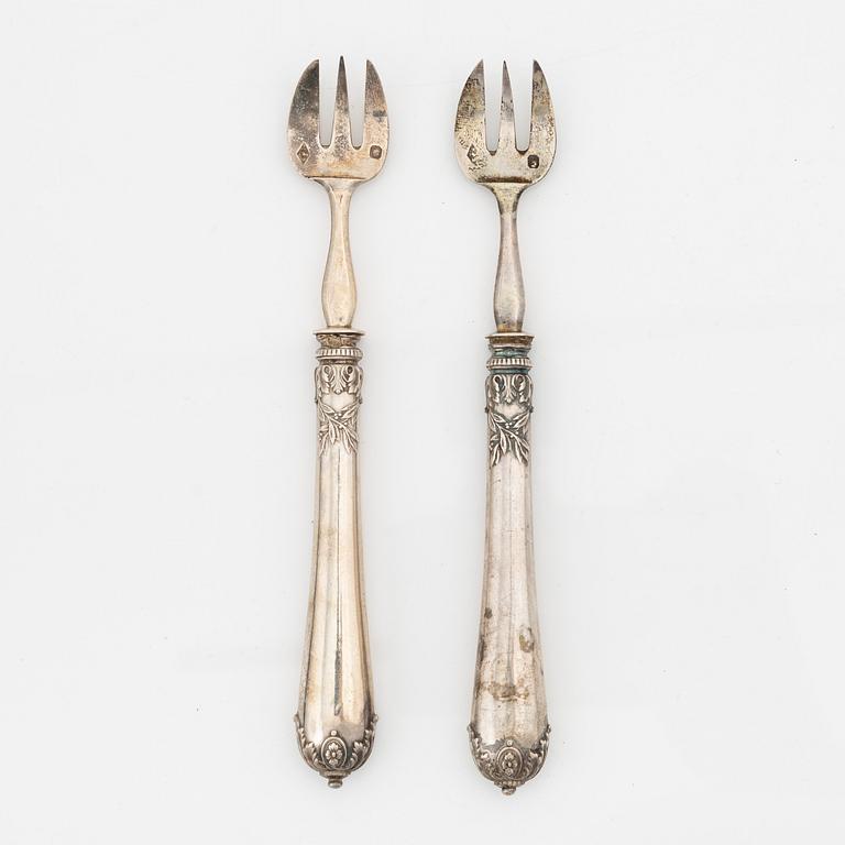 Philippe Berthier, a set of 12 silver oysterforks, mid 19th century.