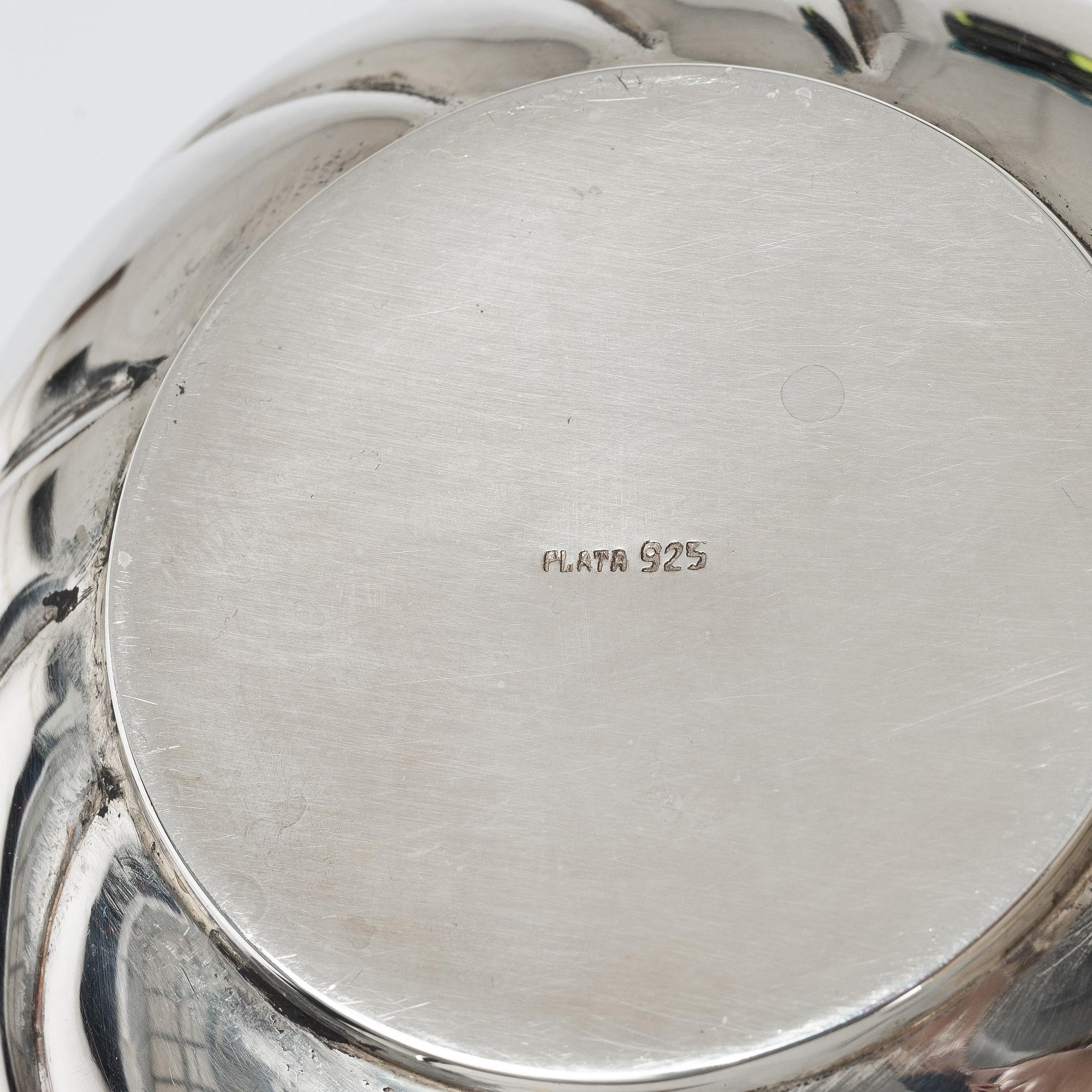 A sterling silver jug, milk jug and sugar bowl, possibly Mexico, mid20th century.