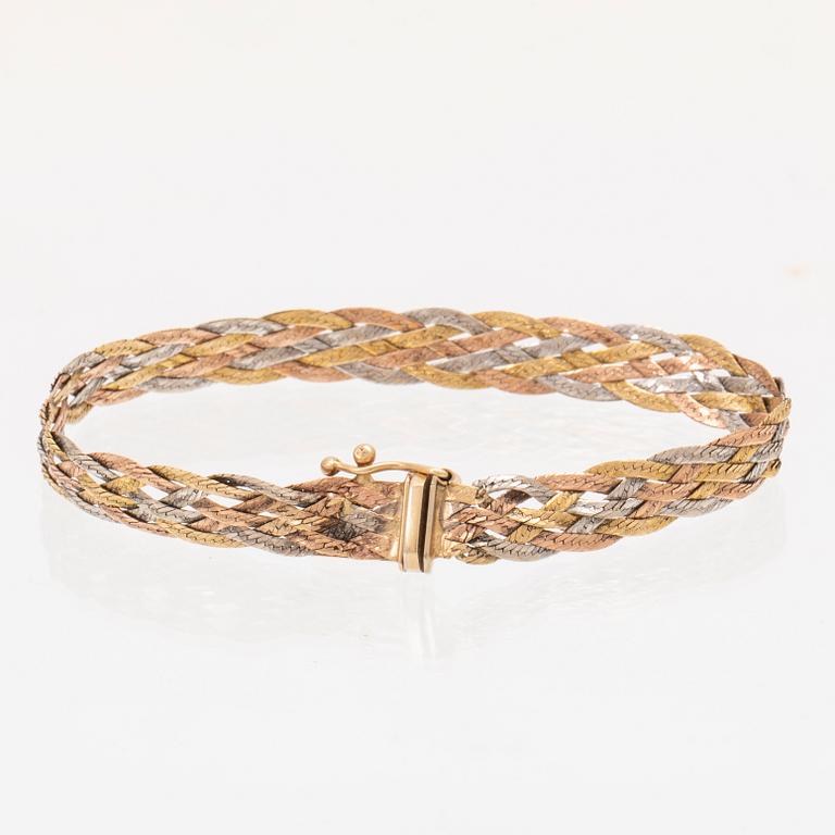 A 14K gold bracelet.