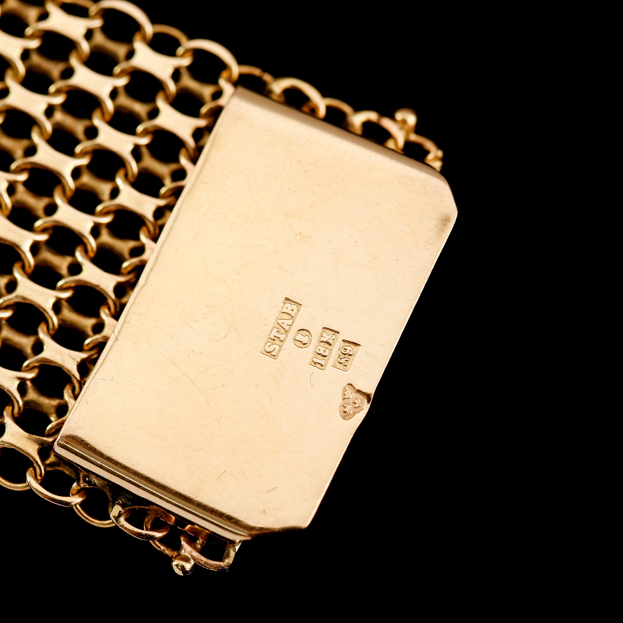 ARMBAND, 18 k guld, 1968, x-länk. Vikt ca 36 gram.