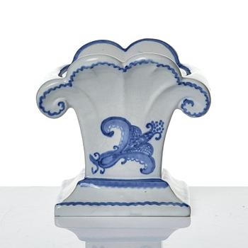 Wilhelm Kåge, eleven pieces of faience including jars, inkwells and a tulip vase, Gustavsberg, Sweden, 1919-1920.