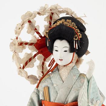 A Japanese doll, early 20th Century.