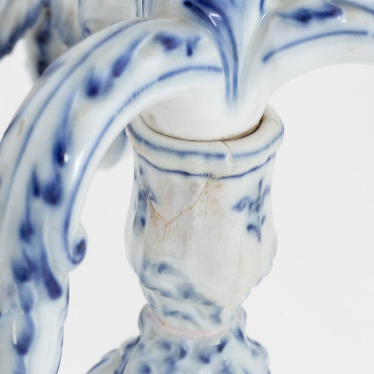 A pair of rococo style porcelain candelabras, Meissen, Germany, early 20th century.