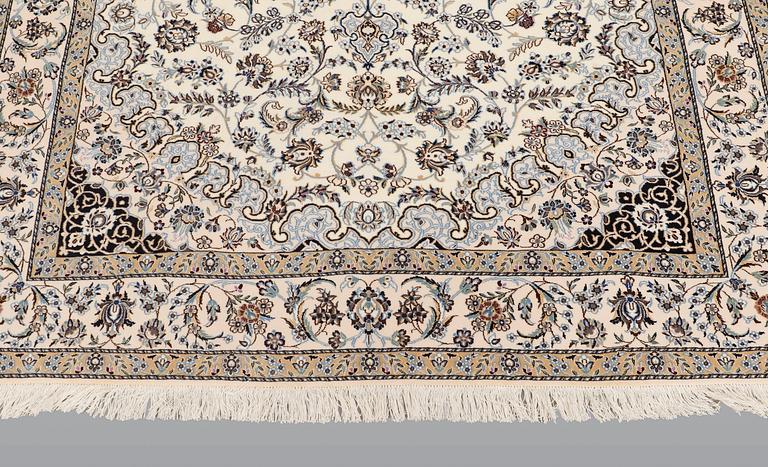A carpet, Nain part silk so called 6 LAA, signed, ca 240 x 137 cm.