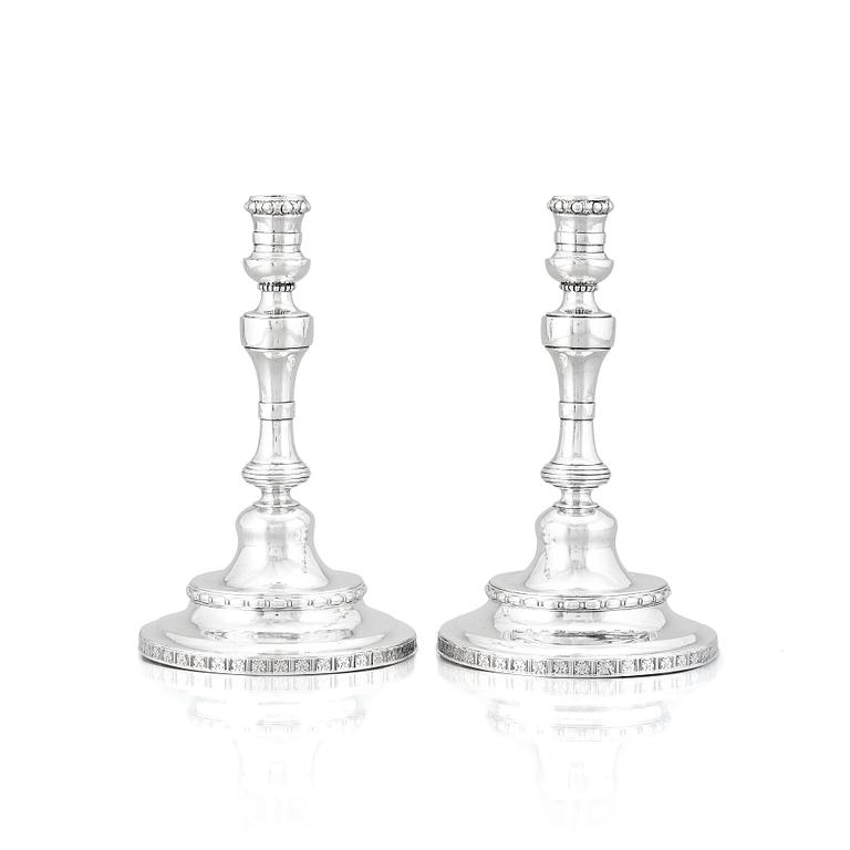 A pair of Swedish Rococo silver candlesticks, mark of Pehr Zethelius, Stockholm 1775.