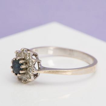 A sapphire and ca 0.25 ct brilliant diamond ring.