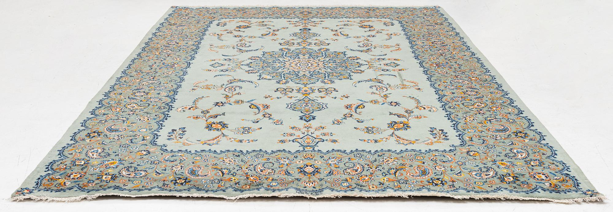 A Keshan carpet, signed, c. 376 x 270 cm.