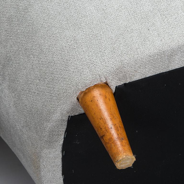 A pair of mid 20th century armchairs.