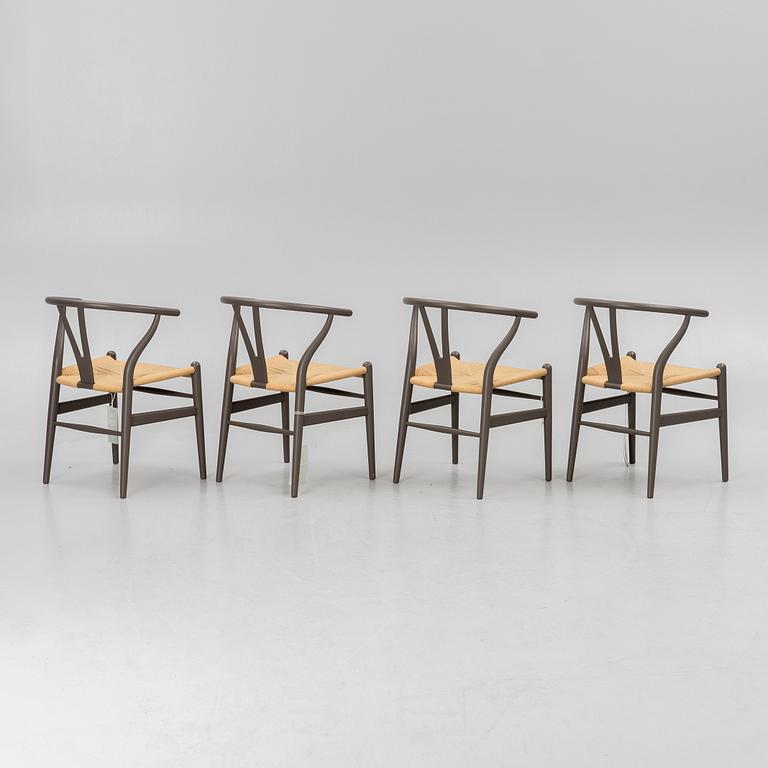 Hans J. Wegner, four CH 24 chairs, Carl Hansen & Son, Denmark.