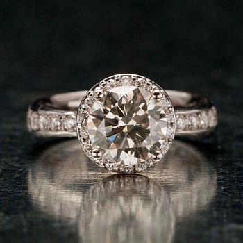 RING, vitguld 18K, briljantslipade diamanter, mittsten 2,60 ct + 0,62 ct. Vikt 8,2 g.