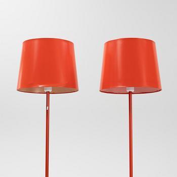 Uno & Östen Kristiansson, a matched pair of red floor lights, Luxus, Vittsjö.