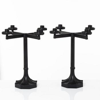 Sigurd Persson, a pair ofa cast iron candelabras, Kockums 1965.