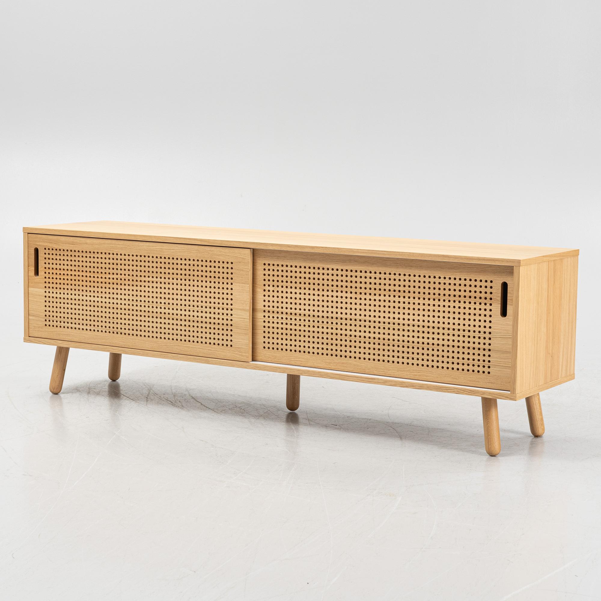 An oak 'Ray' sideboard from Department.
