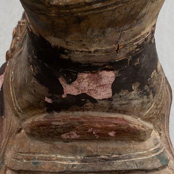 A large modern Chinese wooden sculpture.