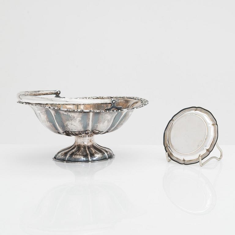 A sweetmeat basket and a 12-piece set of silver coasters, Helsinki and Hämeenlinna, 1920s and 1930s.