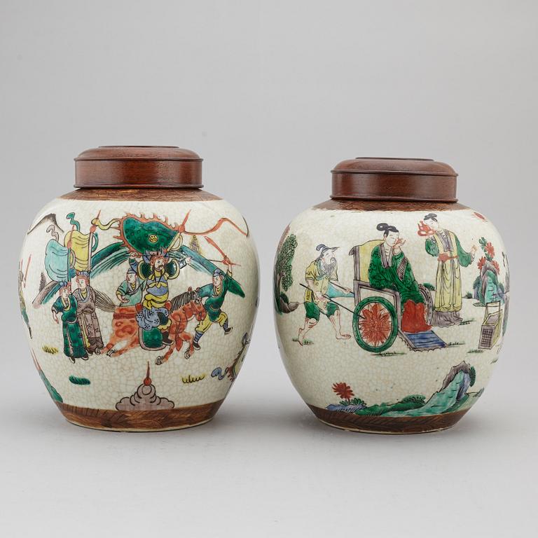 Two Chinese famille verte jars with wooden covers, first half of the 20th century.