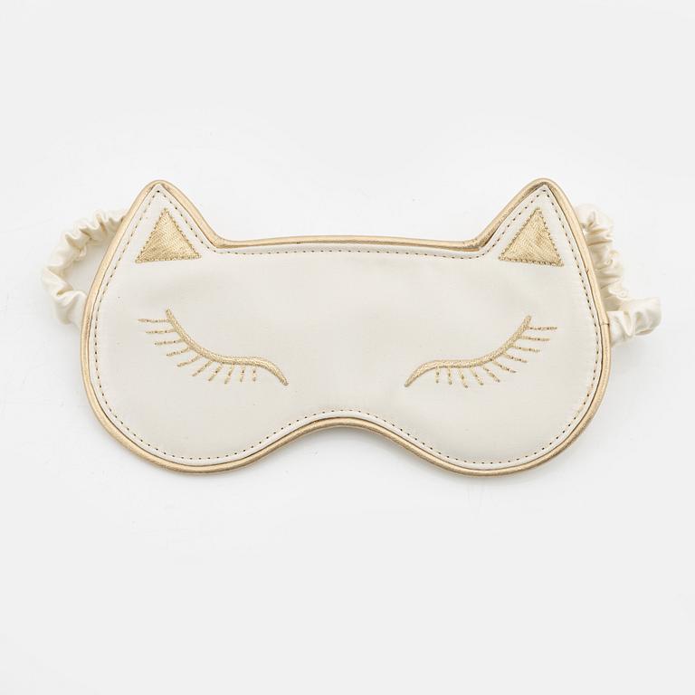 Charlotte Olympia, a pair of 'Cat nap' silk flats, a sleeping mask and a toilet bag, size S.
