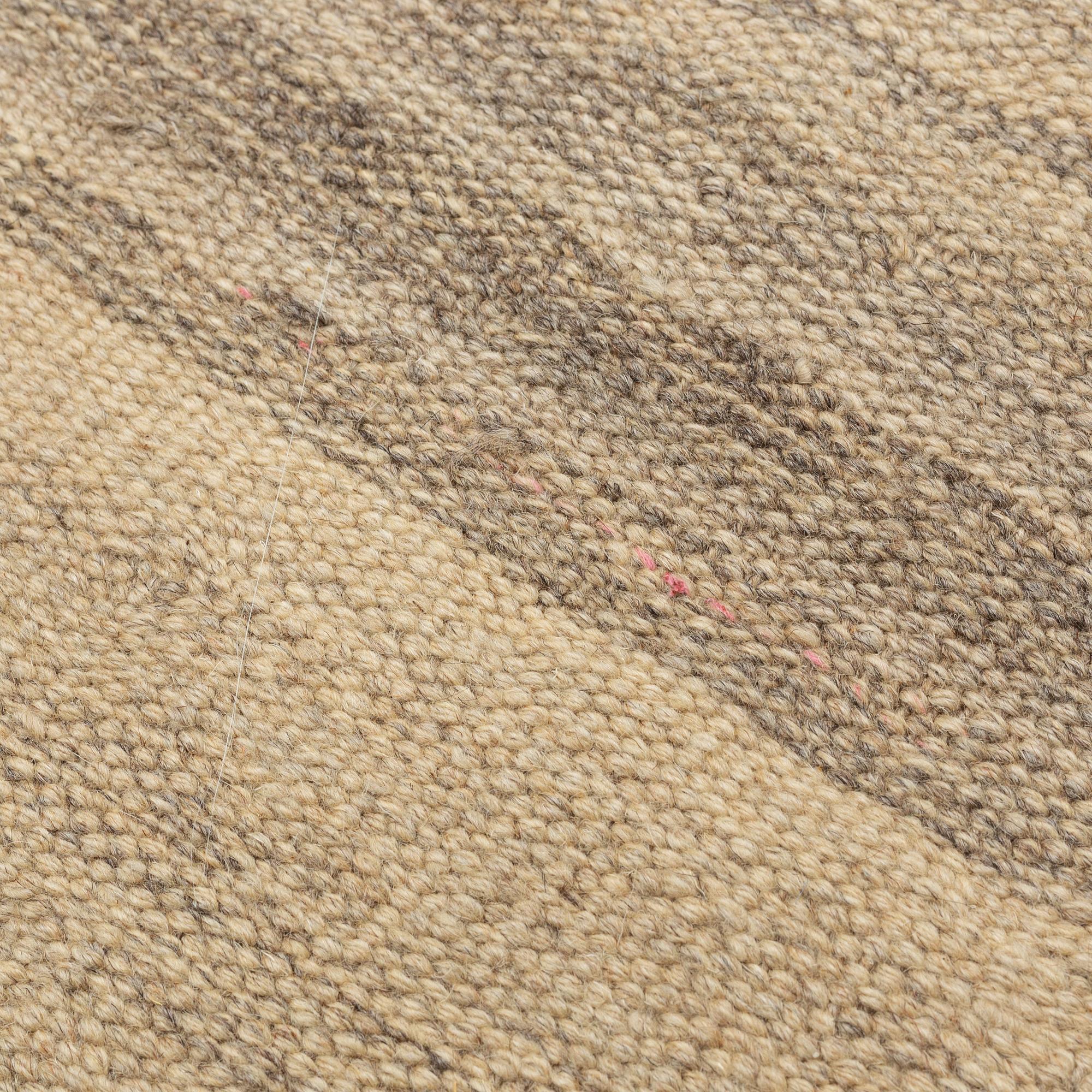 A persian kilim, ca 300 x 200 cm.