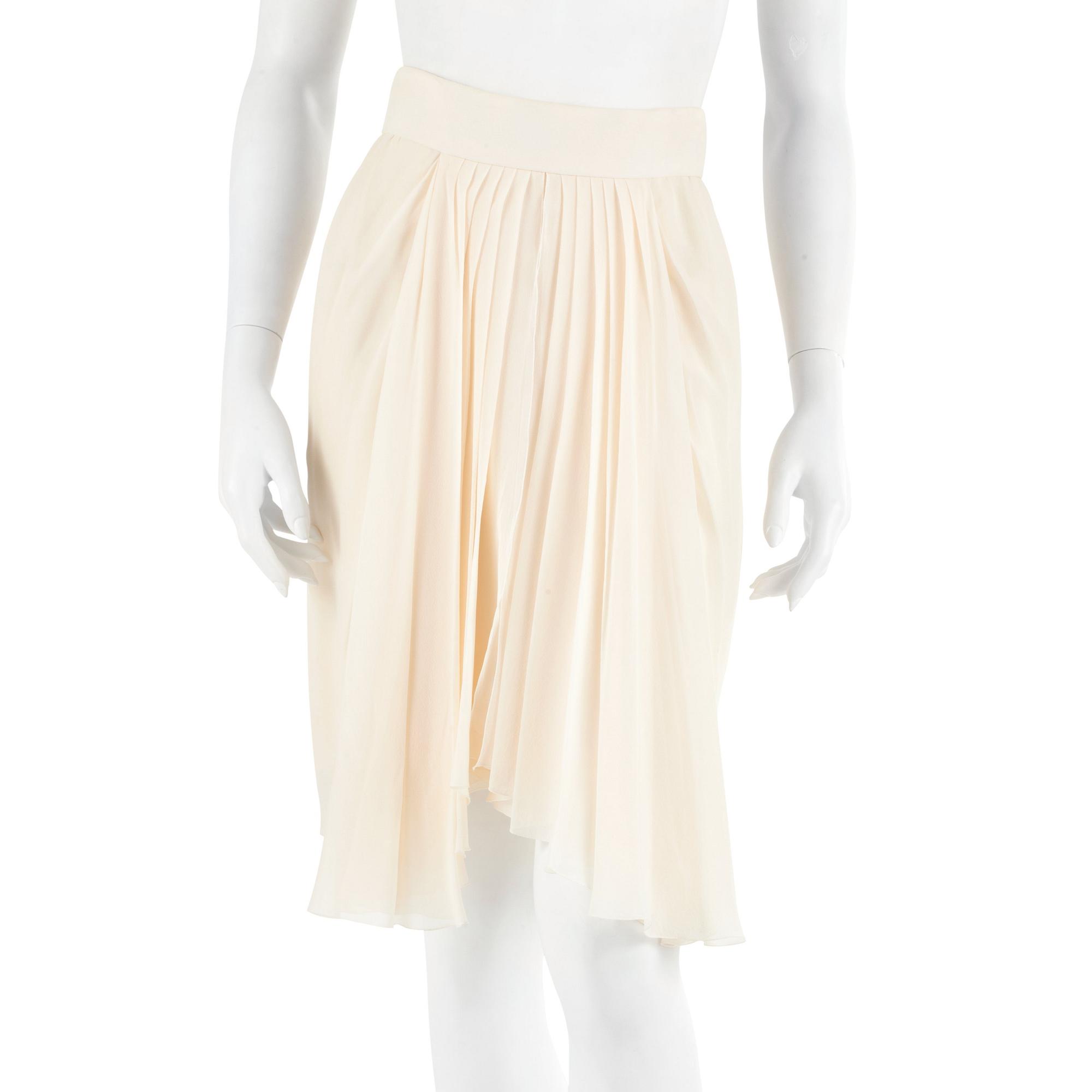 CHANEL, a bonewhite silk skirt. French size 40.