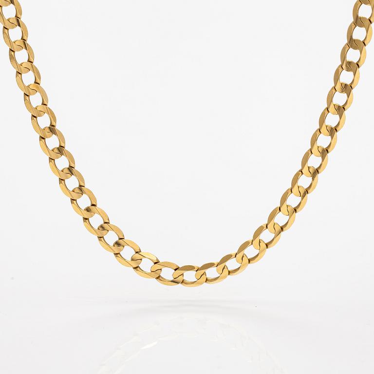 An 18K gold necklace. Unoaerre, Italy.