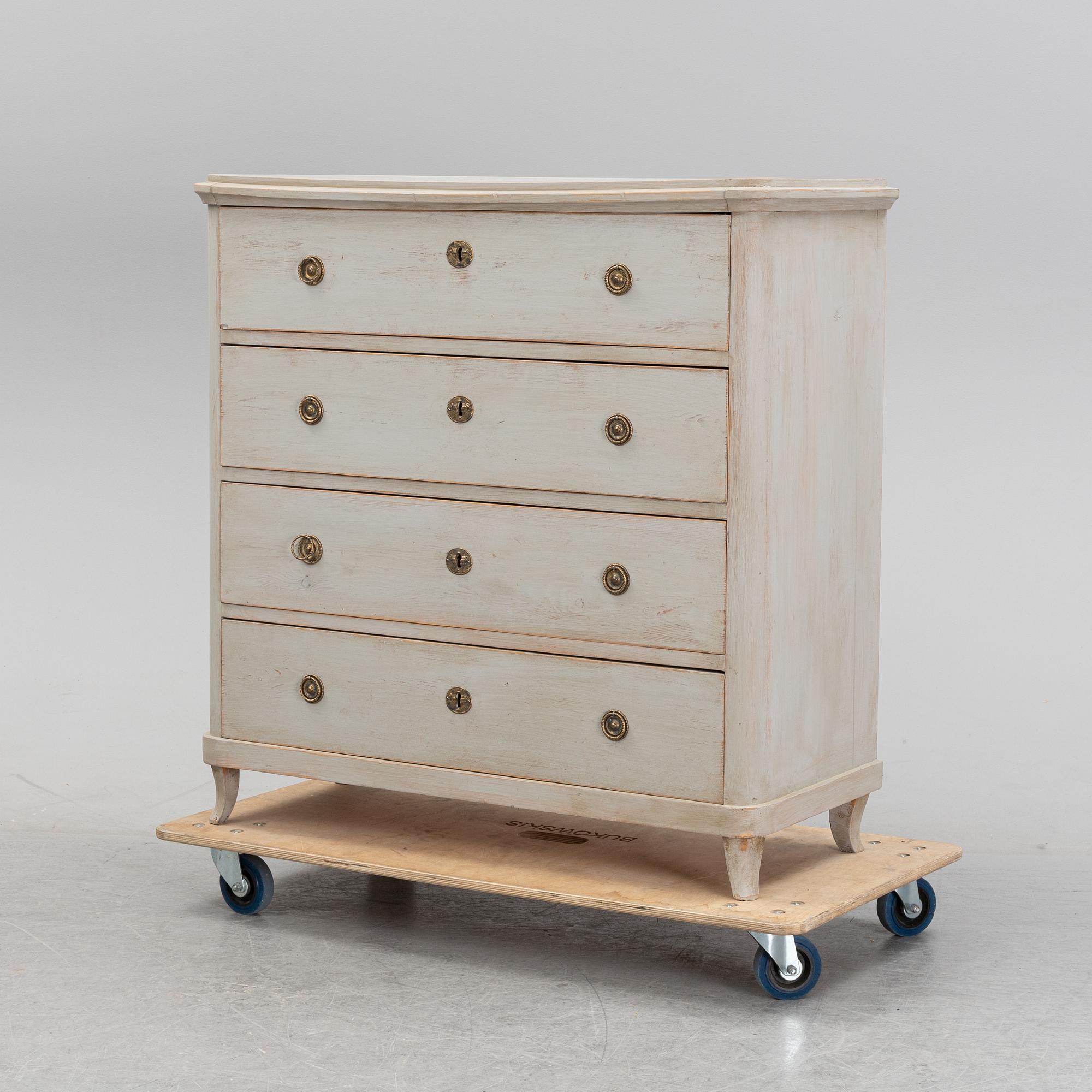 A painted chest of drawers, 19th Century.