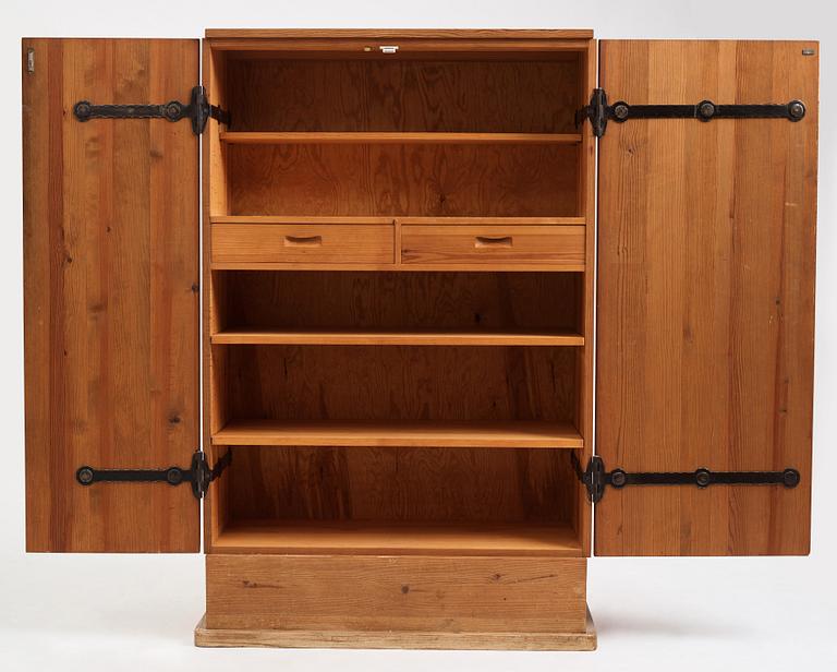 Axel Einar Hjorth, a stained pine 'Lovö' cabinet, Nordiska Kompaniet, Sweden 1930s.