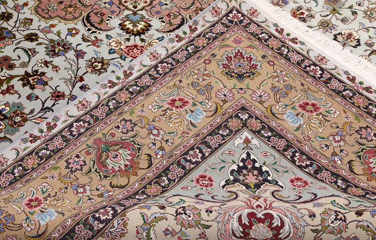 A Tabriz carpet, part silk, so-called 50 Raj, approx. 348 x 252 cm.