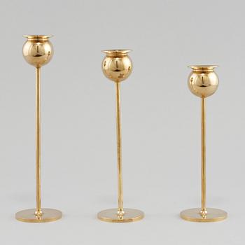 LJUSSTAKAR, 3 st, mässing, "Tulpan", Pierre Forsell, Skultuna, 1900-talets andra hälft.