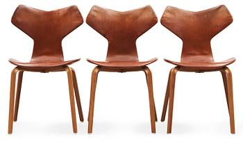 Three Arne Jacobsen teak and brown leather 'Grand Prix' chairs, Fritz Hansen, Denmark 1950's-60's.