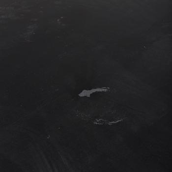 A modern square metal sofa table.