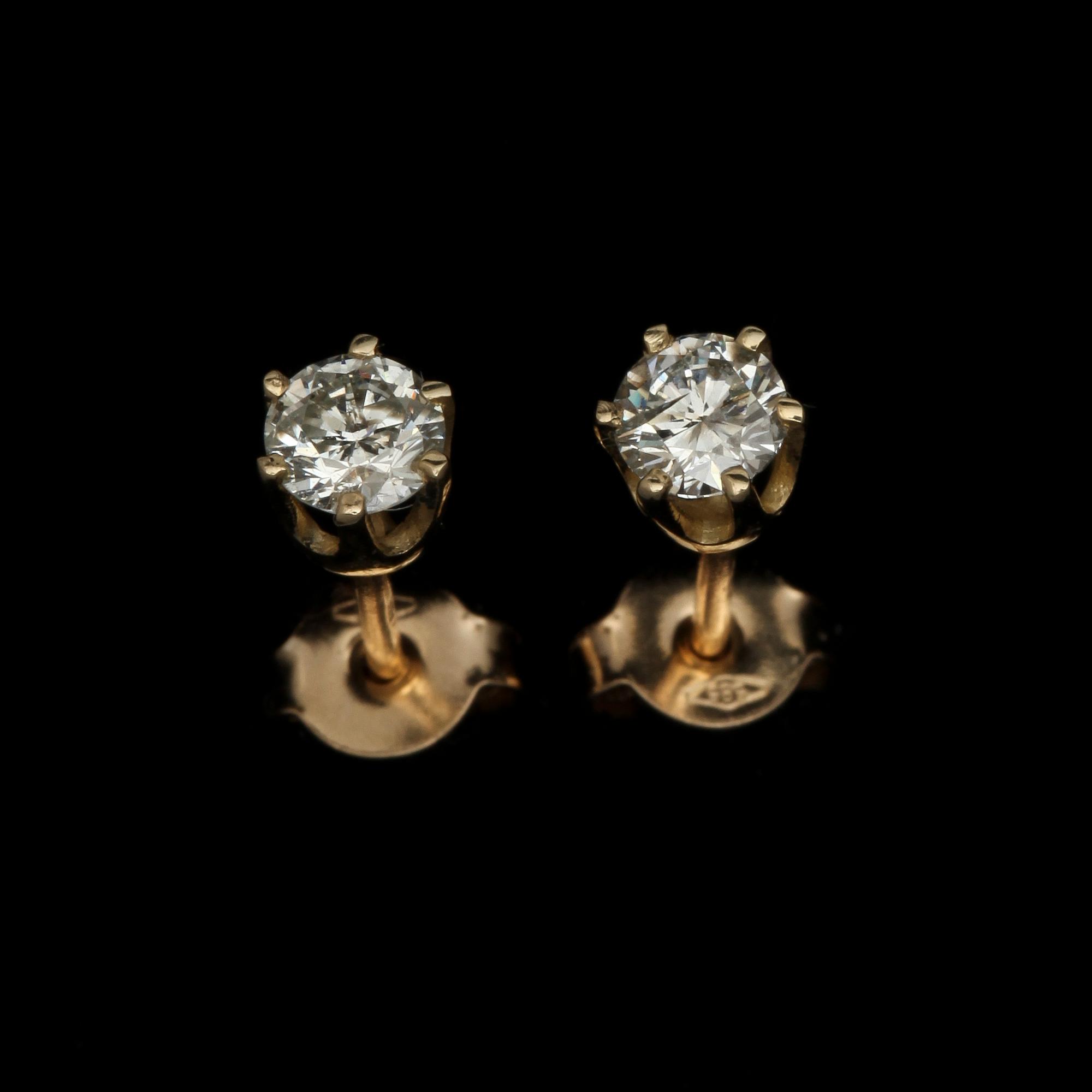 ÖRHÄNGEN, ett par, 14k guld med briljantslipade diamanter tot ca 0,46 ct. Vikt 1 g.