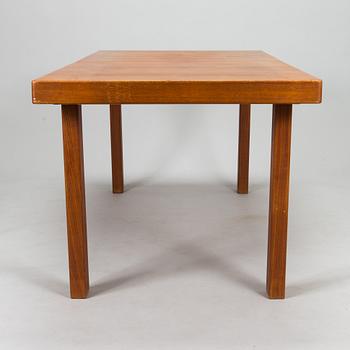 Carl Gustaf Hiort af Ornäs, a mid-20th Century dining table and eight chairs for  för HMN Huonekalu Mikko Nupponen.