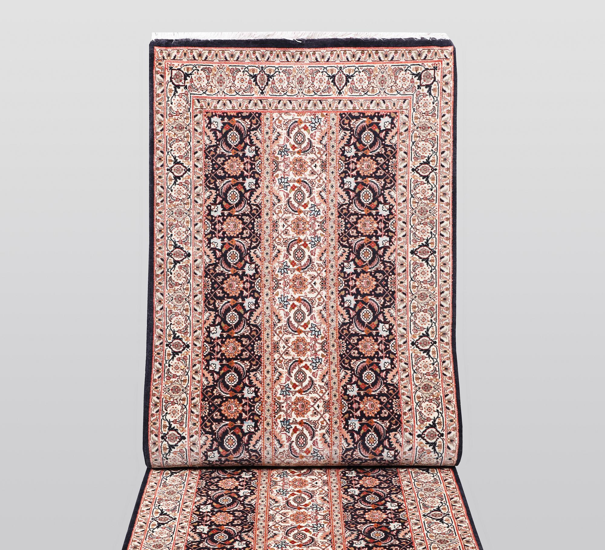 A runner, Täbris, part silk, ca 297 x 81 cm.