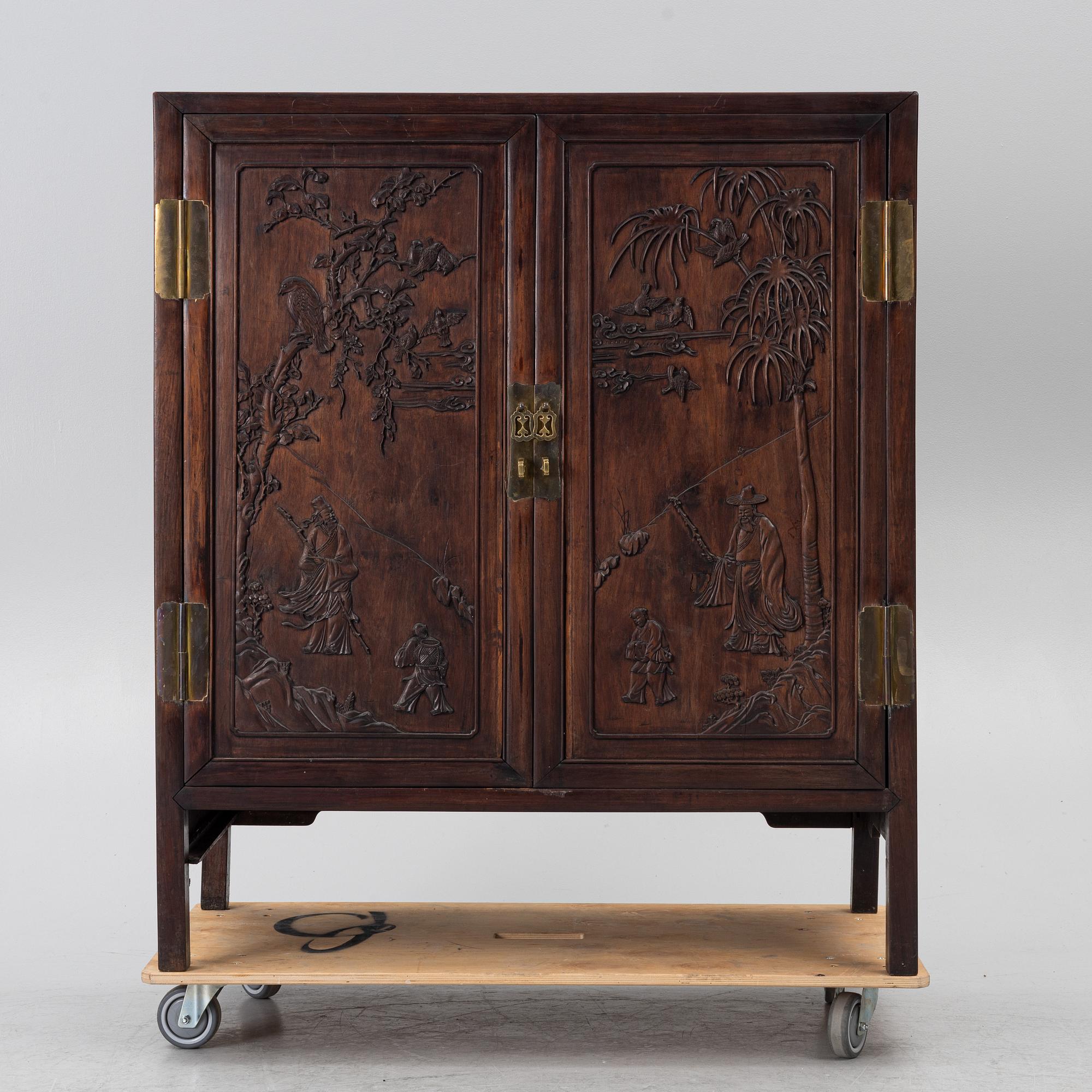 A hardwood cabinet, China, 20th century.