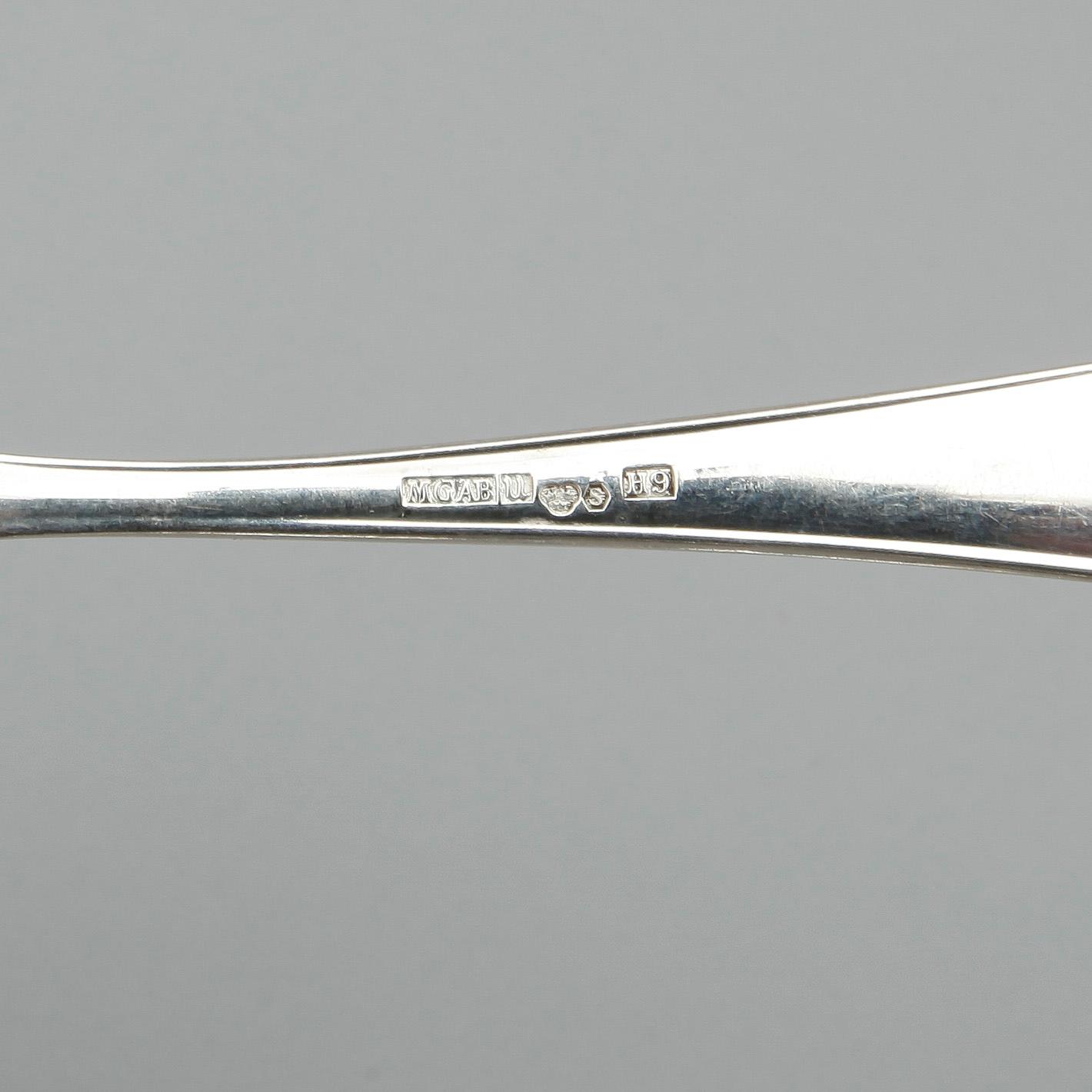 BORDSSKEDAR, 12 stycken, silver, "Disa", Linus Holst, MGAB Uppsala, 1950-tal. Total vikt ca 432 gram.