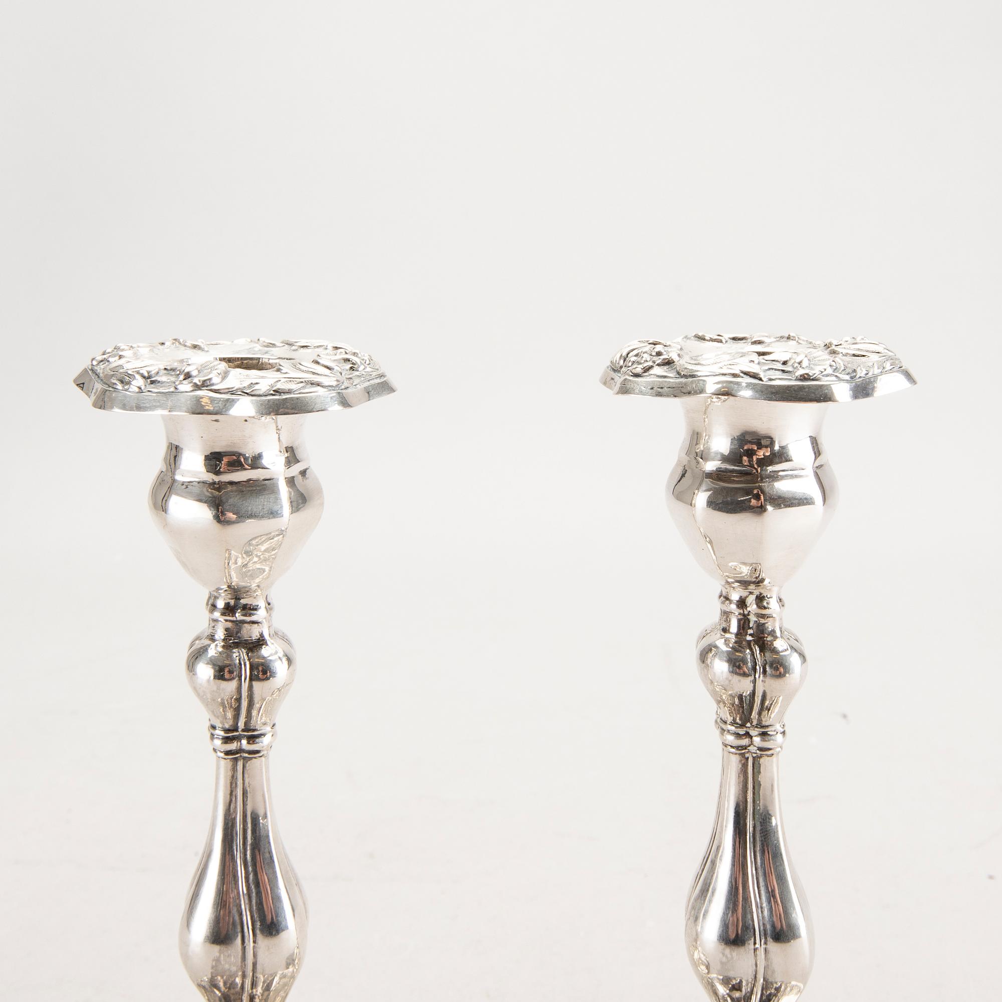 A 19th century pair of silver candle sticks mark of Oskar Närman Mariestad 1877.