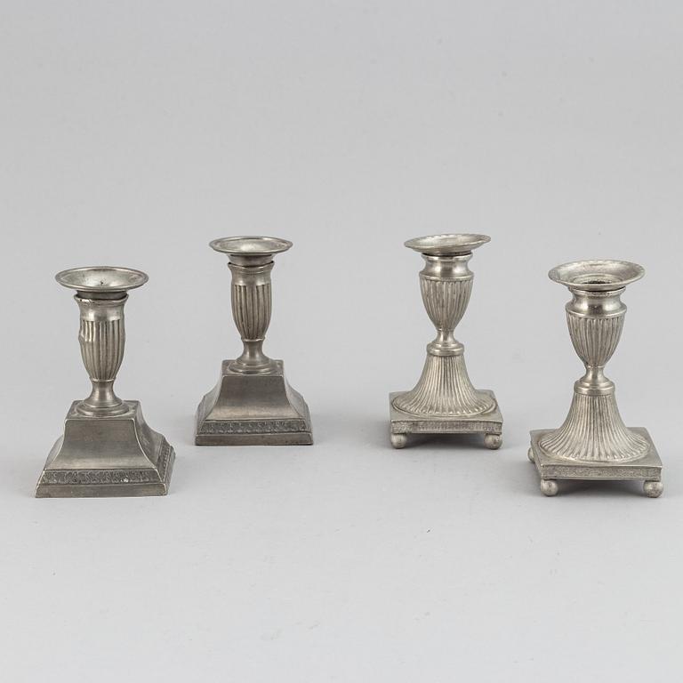 Two pairs of Swedish pewter candlesticks by Erik Wikgren, possibly and Nils Silov, first half of the 19th century.