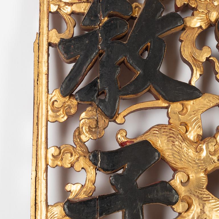 A pair of Chinese wooden panels, late Qing dynasty / around 1900.