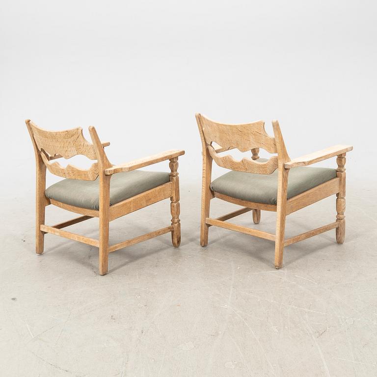 Henry (Henning) Kjaernulf, pair of arm chairs Nyrup furniture factory, Denmark, mid 20th century.
