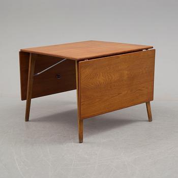 BØRGE MOGENSEN, a teak and oak dining table model 162, Søborg Møbelfabrik Denmark 1950's.