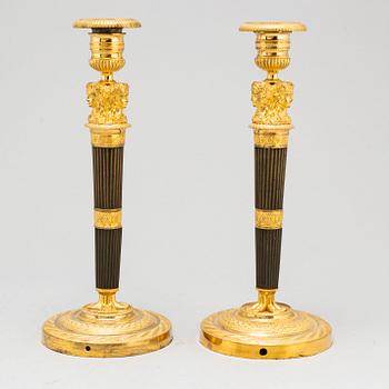 A pair of French Empire candlesticks, early 19th century.