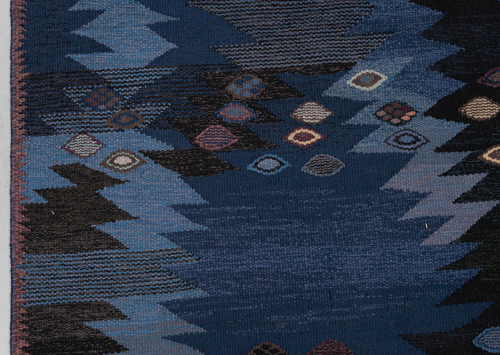 Barbro Nilsson, a carpet, "Tånga blå", flat weave, ca 243,5 x 173 cm, signed AB MMF BN.