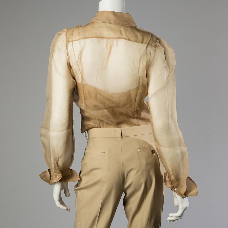 Trousers, shirt and west by Ralph Lauren.