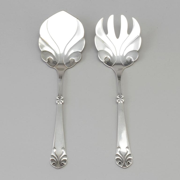 A Danish Art Nouveau silver serving spoon and fork, maker's mark Axel Oluf Olsen, Copenhagen 1914.